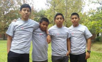 (from left) Christopher, Armando, Jorge, and Carlos—young men raised and educated under the care of Mother Ines, and “stars” of St. Vladimir’s #GivingTuesday campaign—wearing their #GivingTuesday T-shirts.