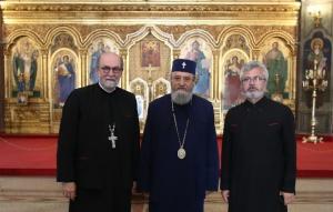 (from left) President Archpriest Chad Hatfield, Metropolitan of Transylvania His Eminence Laurentiu, and Vice-Dean ​of the Faculty of Theology in Sibiu,​ ​Priest​ Aurel Pavel